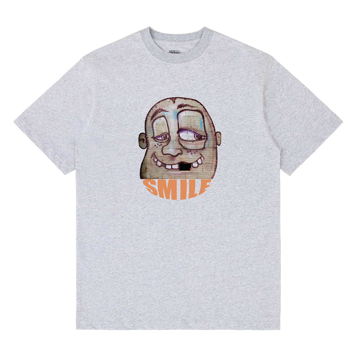 The Smiling Face with Missing Tooth Tee